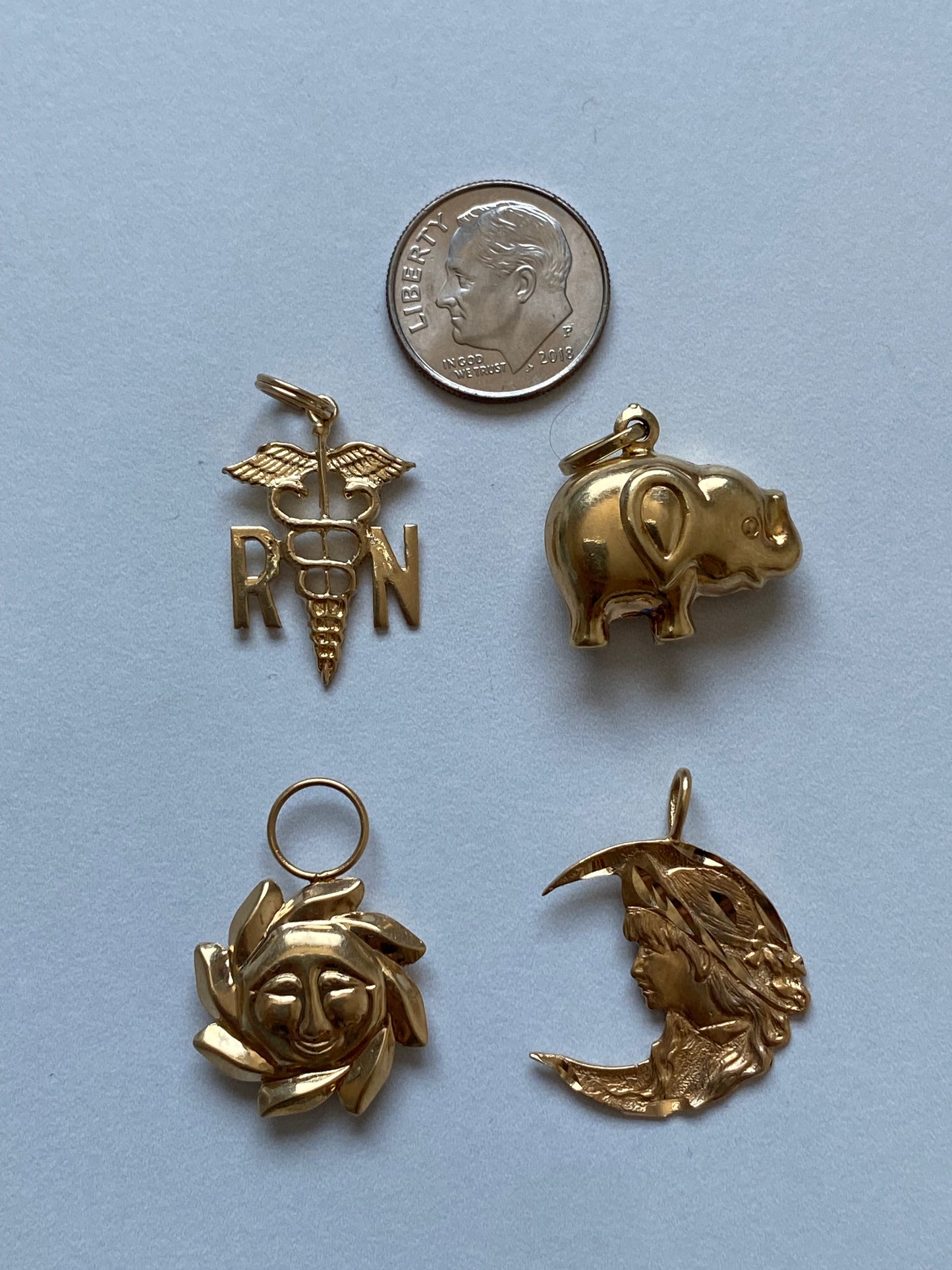 Small gold pendants and charms