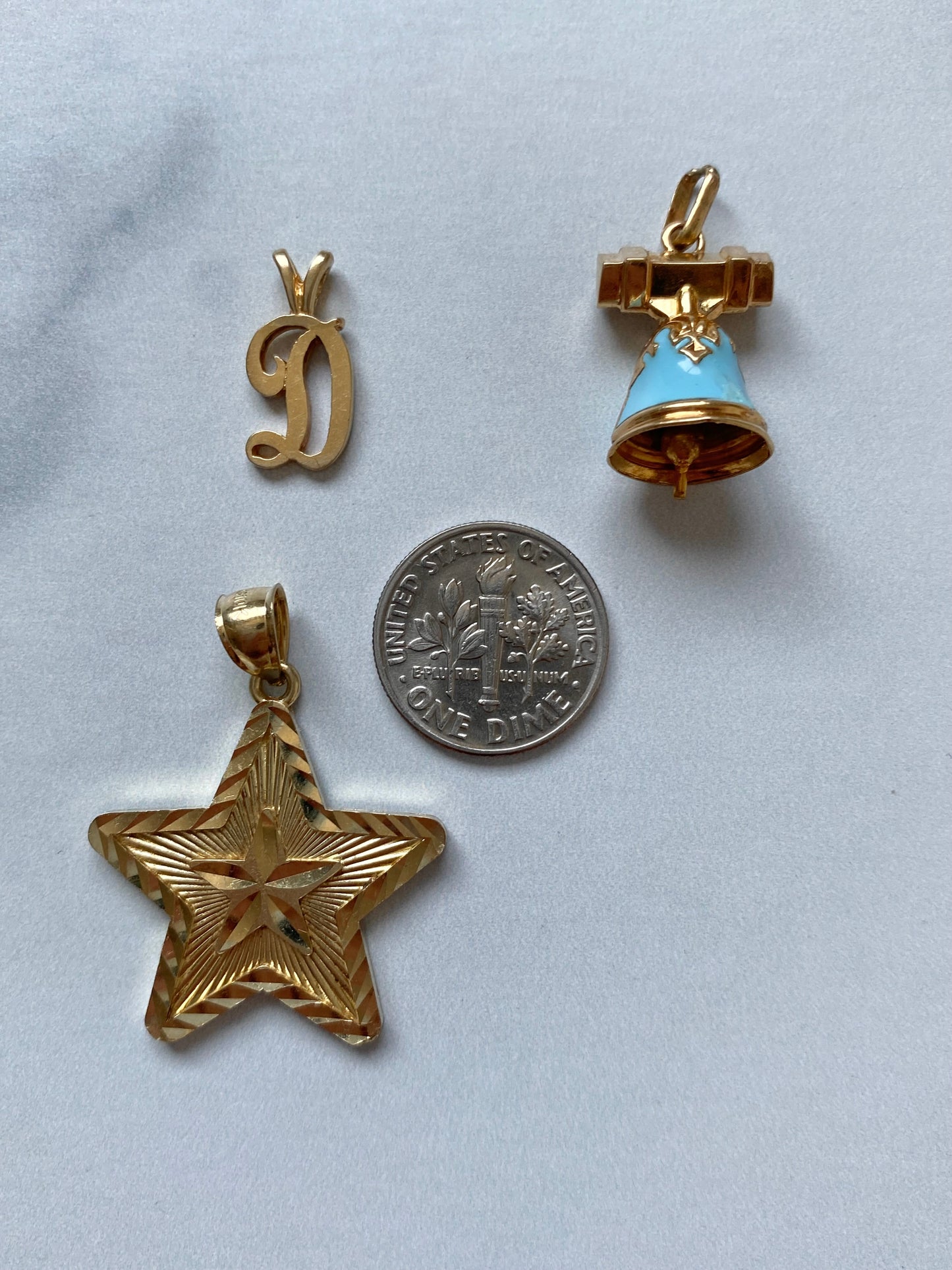 Small gold pendants and charms