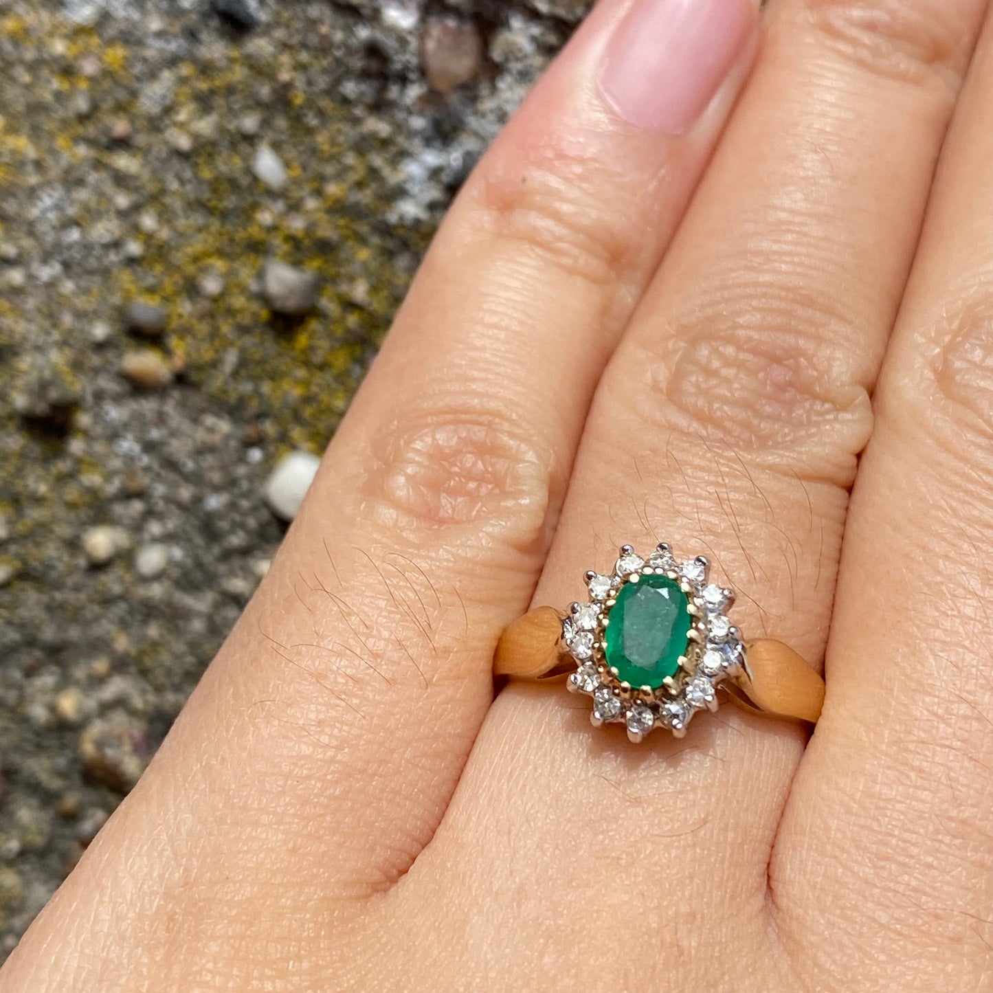 Emerald and diamond cluster ring