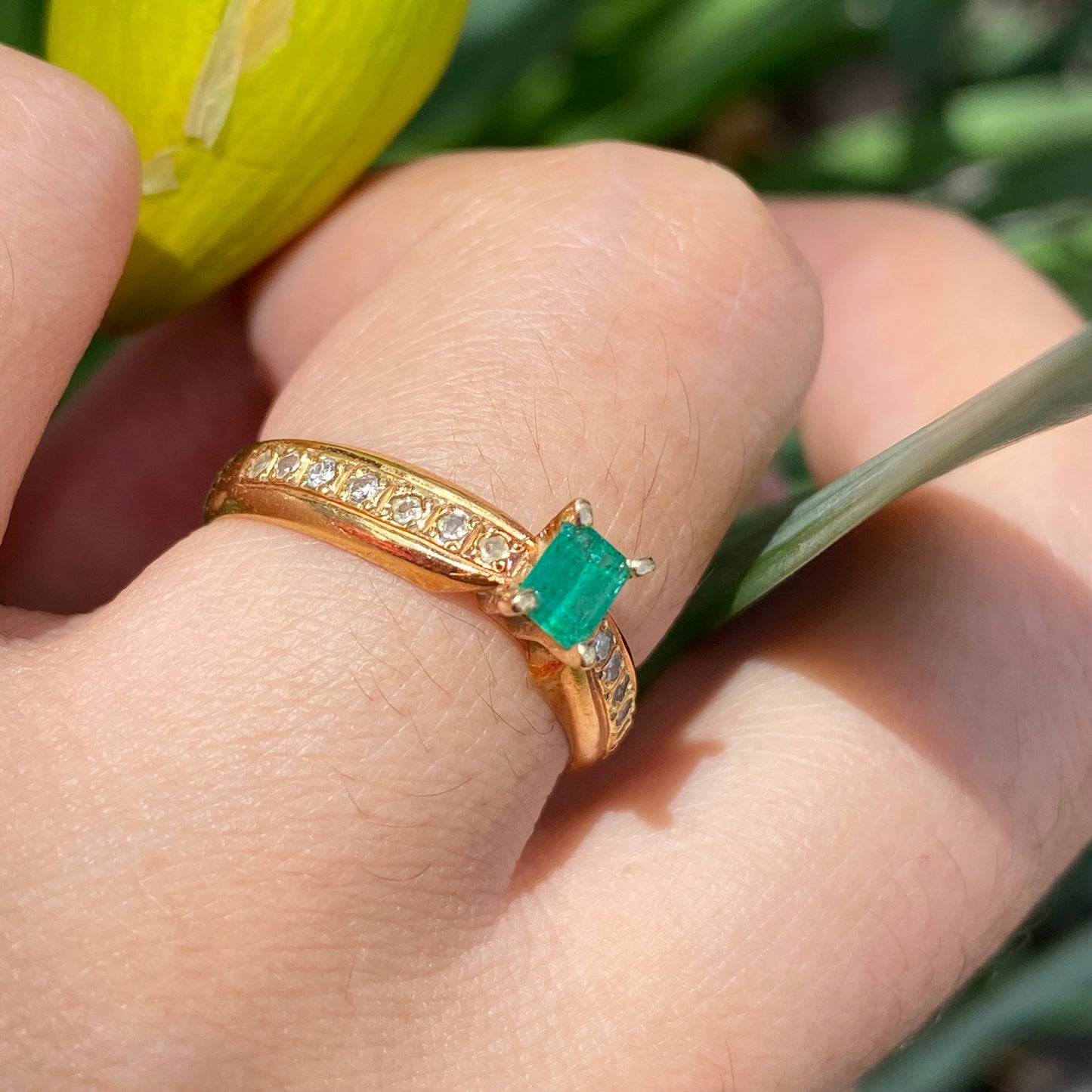 Emerald and diamond band ring