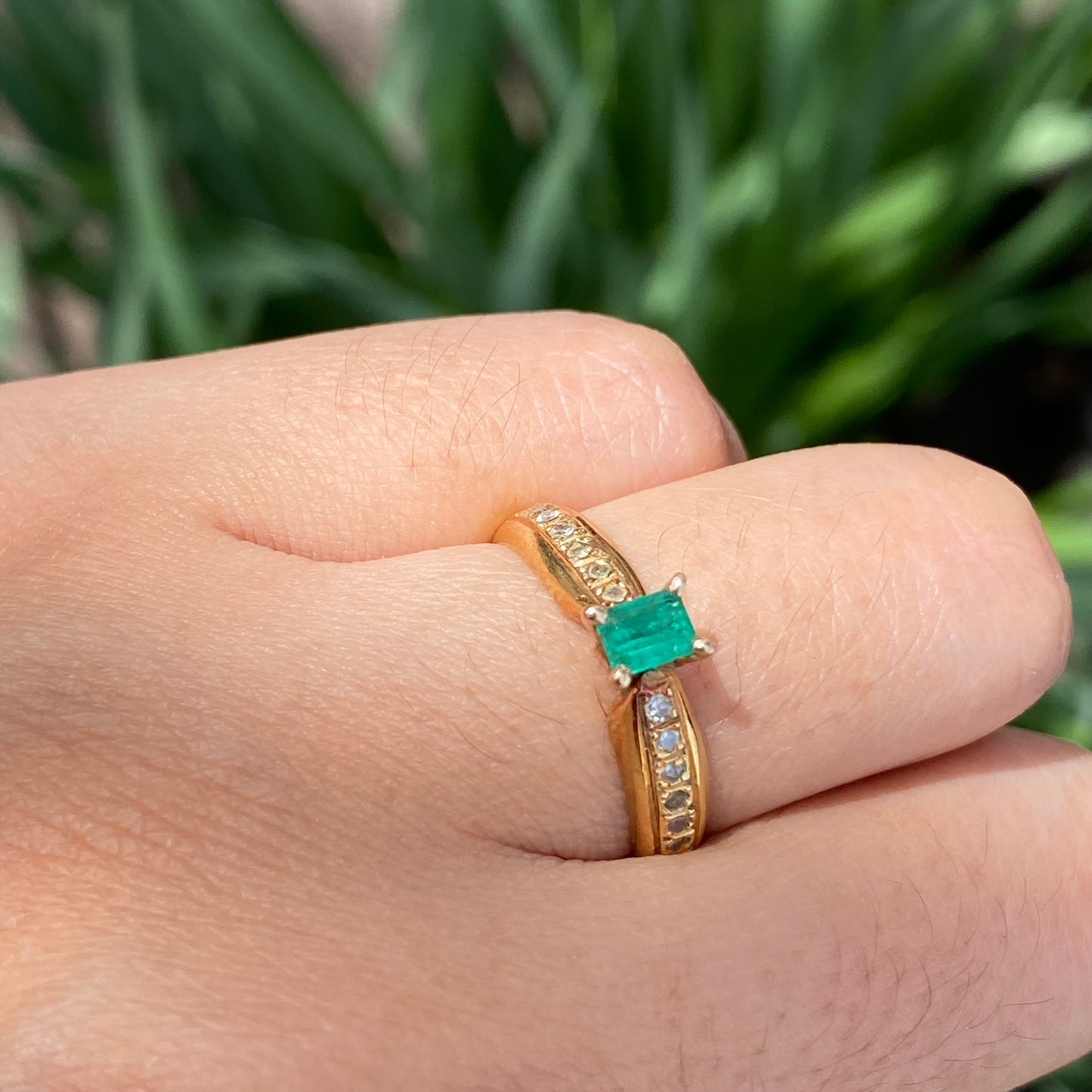 Emerald and diamond band ring