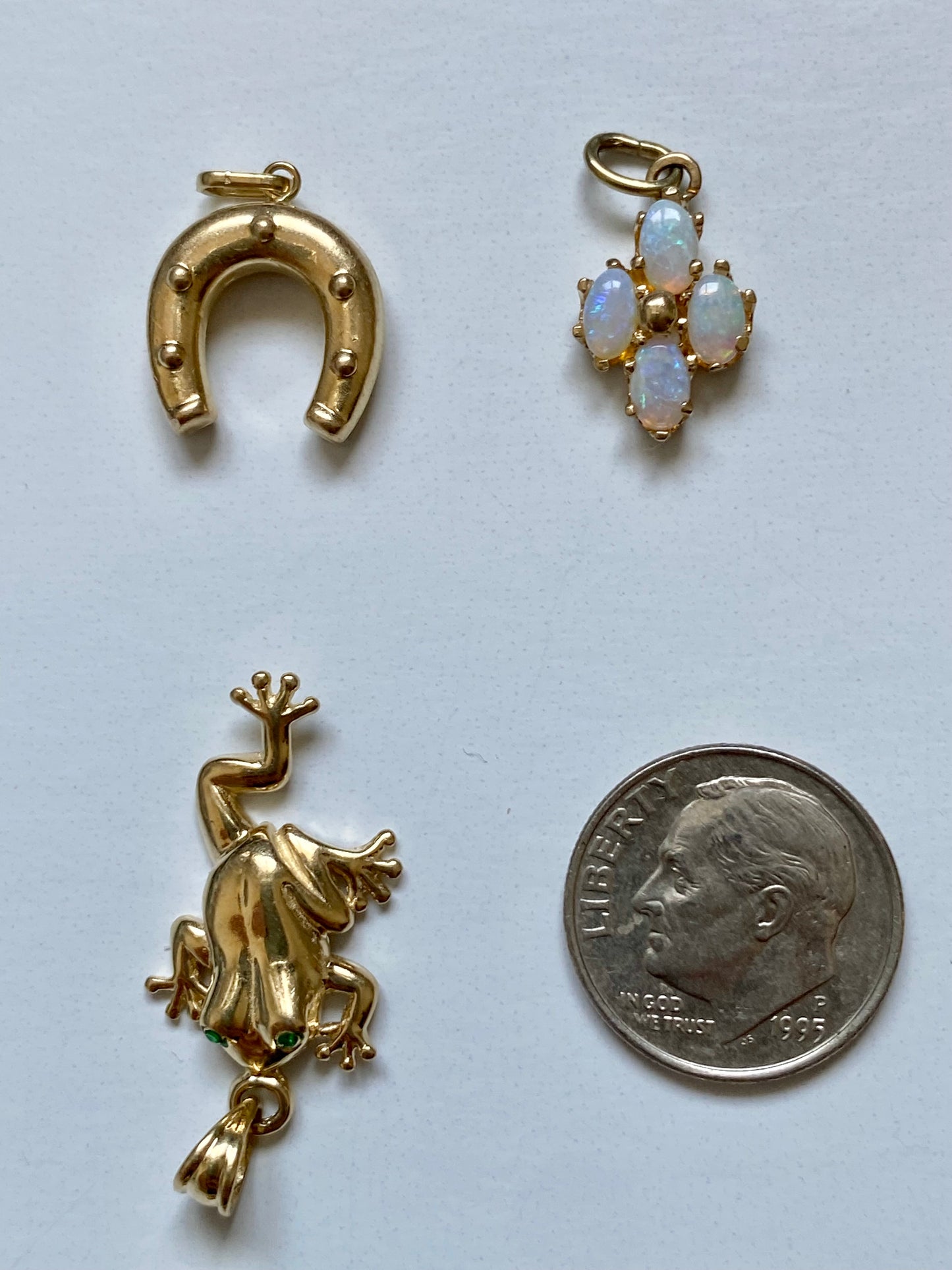 Small gold pendants and charms