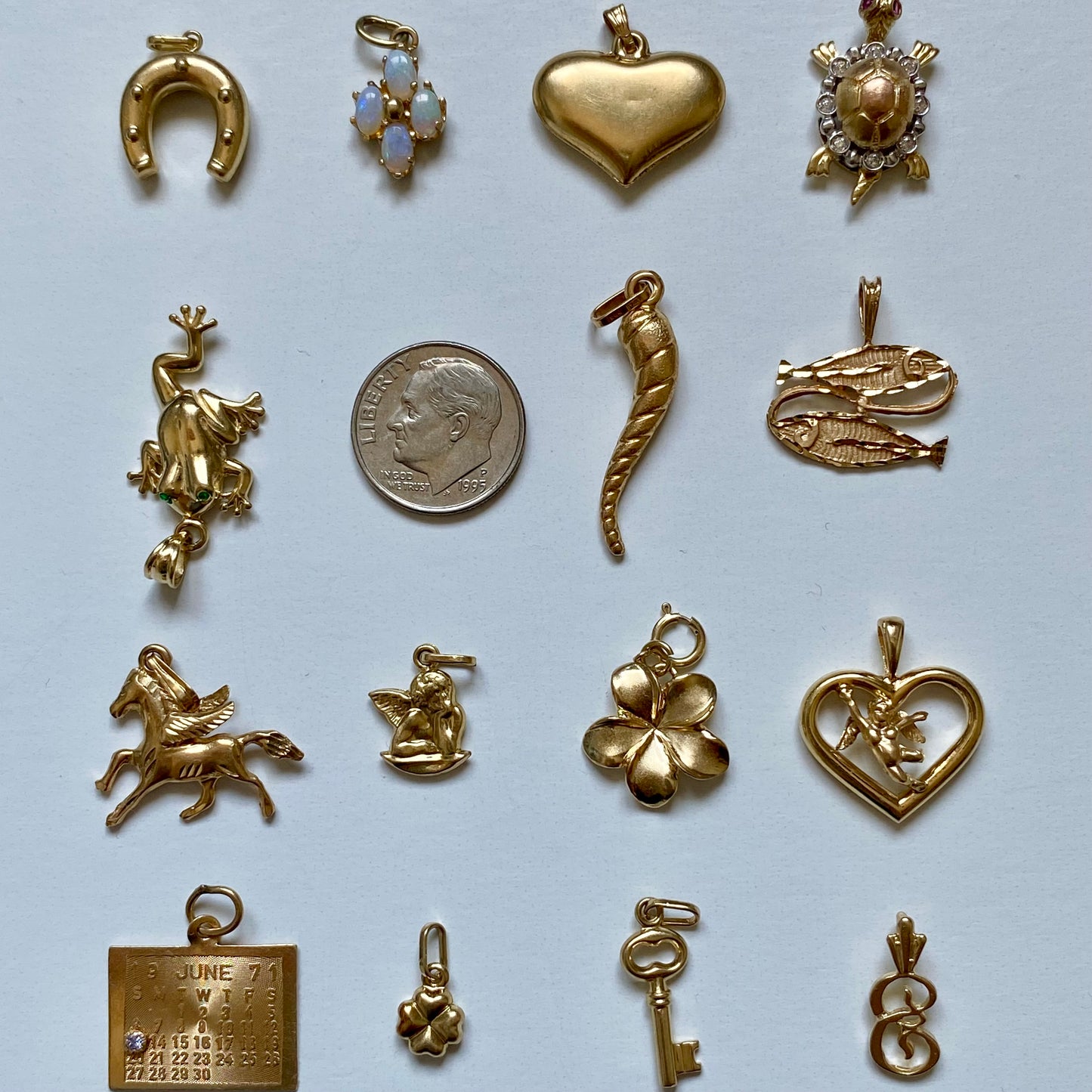 Small gold pendants and charms