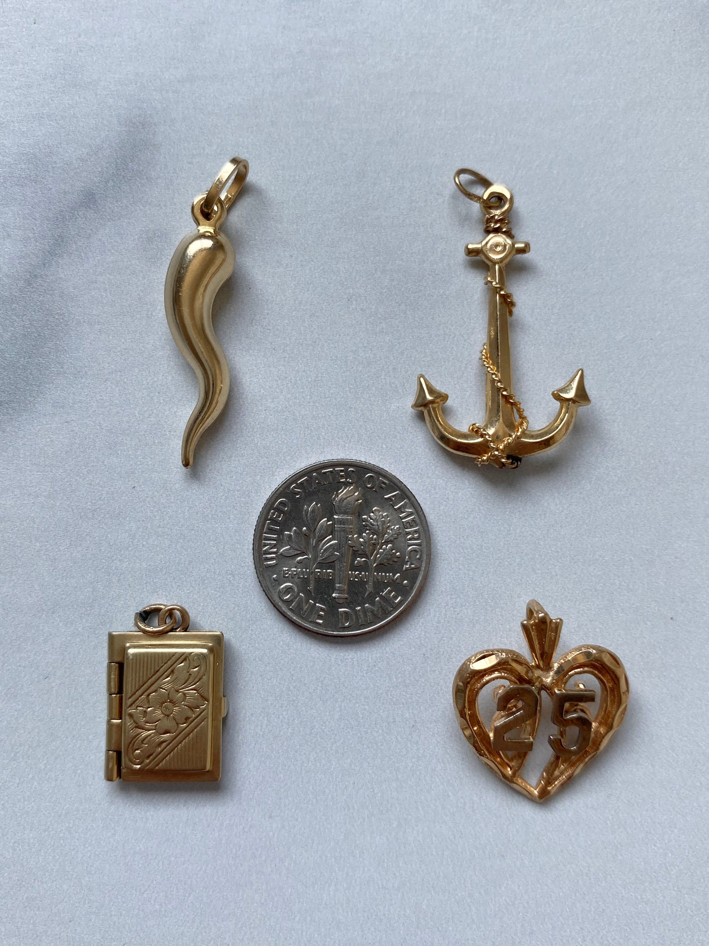 Small gold pendants and charms