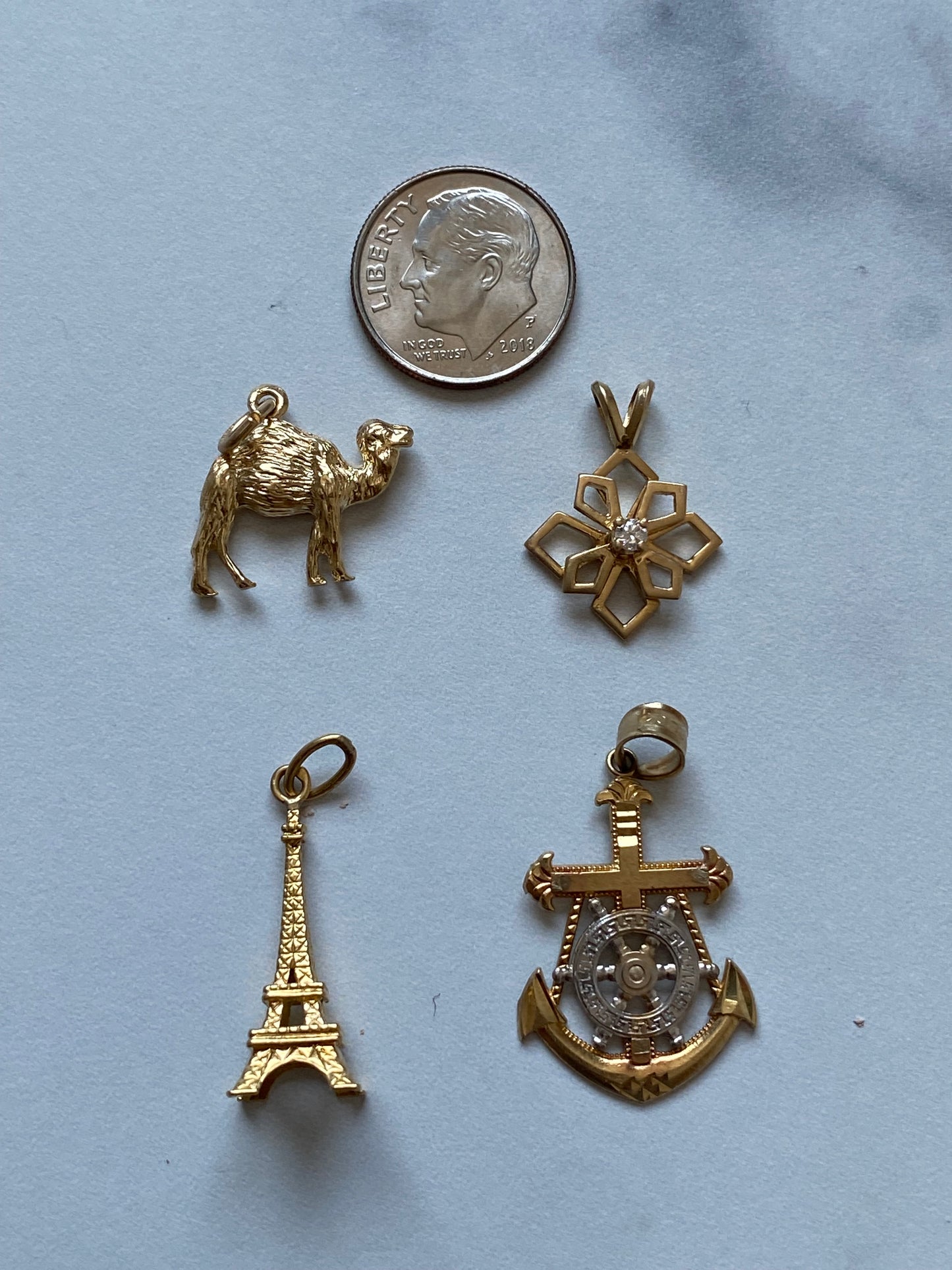 Small gold pendants and charms