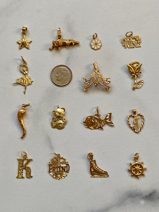 Small gold pendants and charms