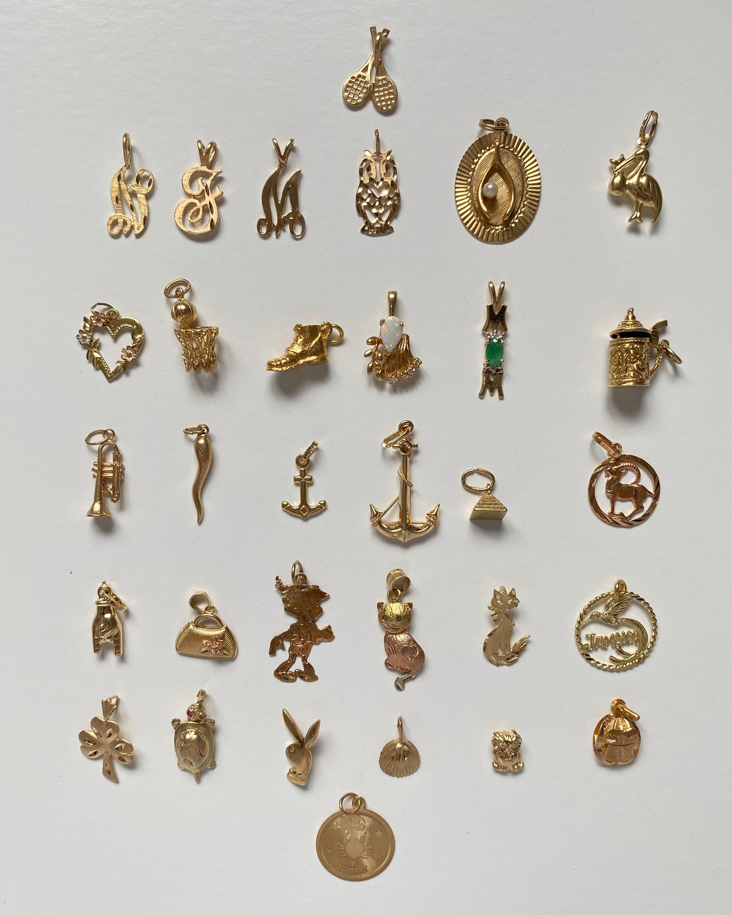 Small gold pendants and charms