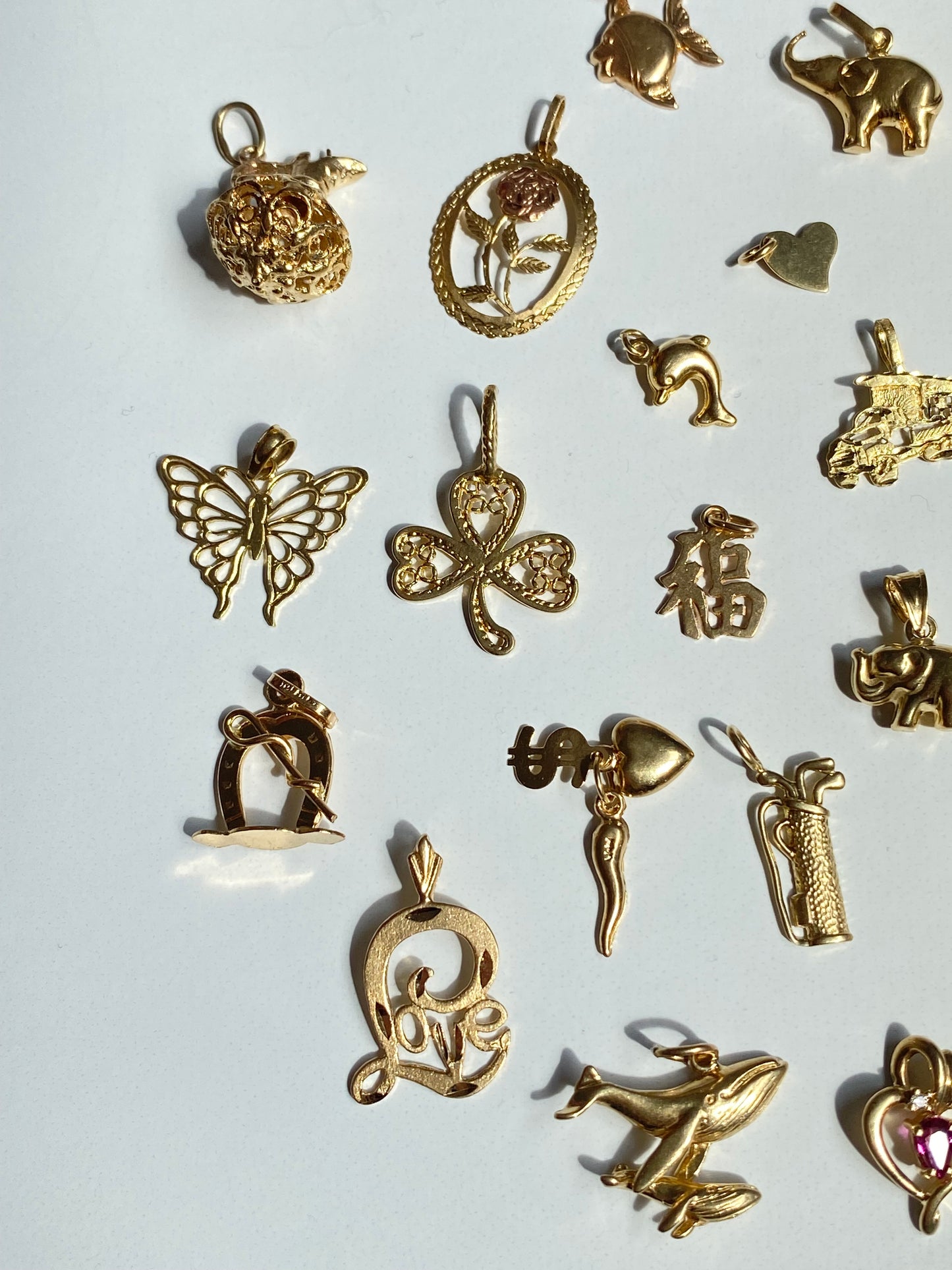 Small gold pendants/charms