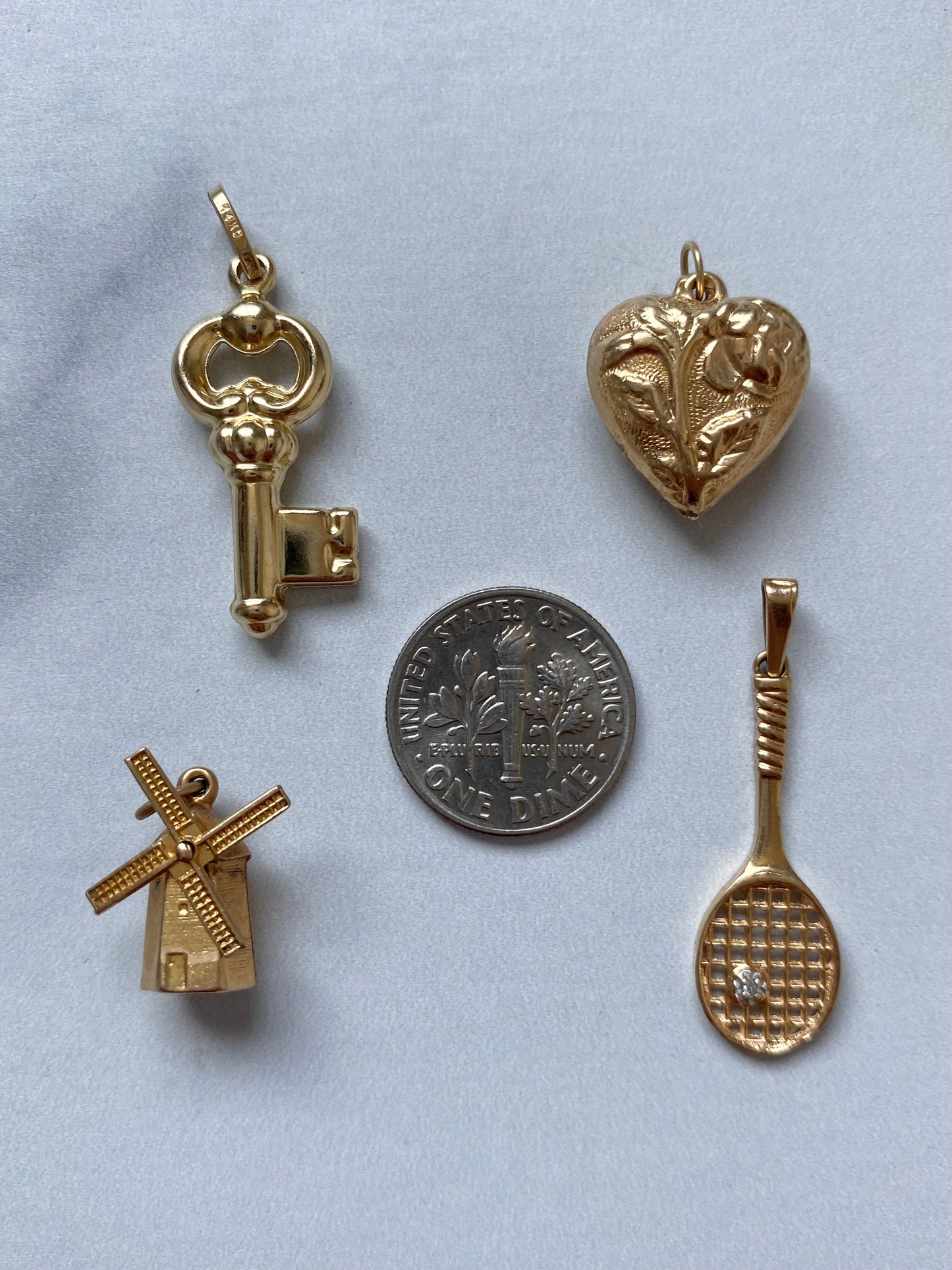 Small gold pendants and charms