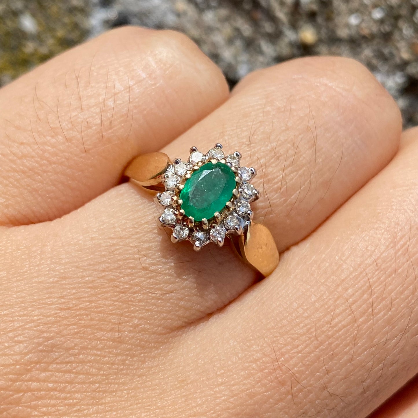 Emerald and diamond cluster ring