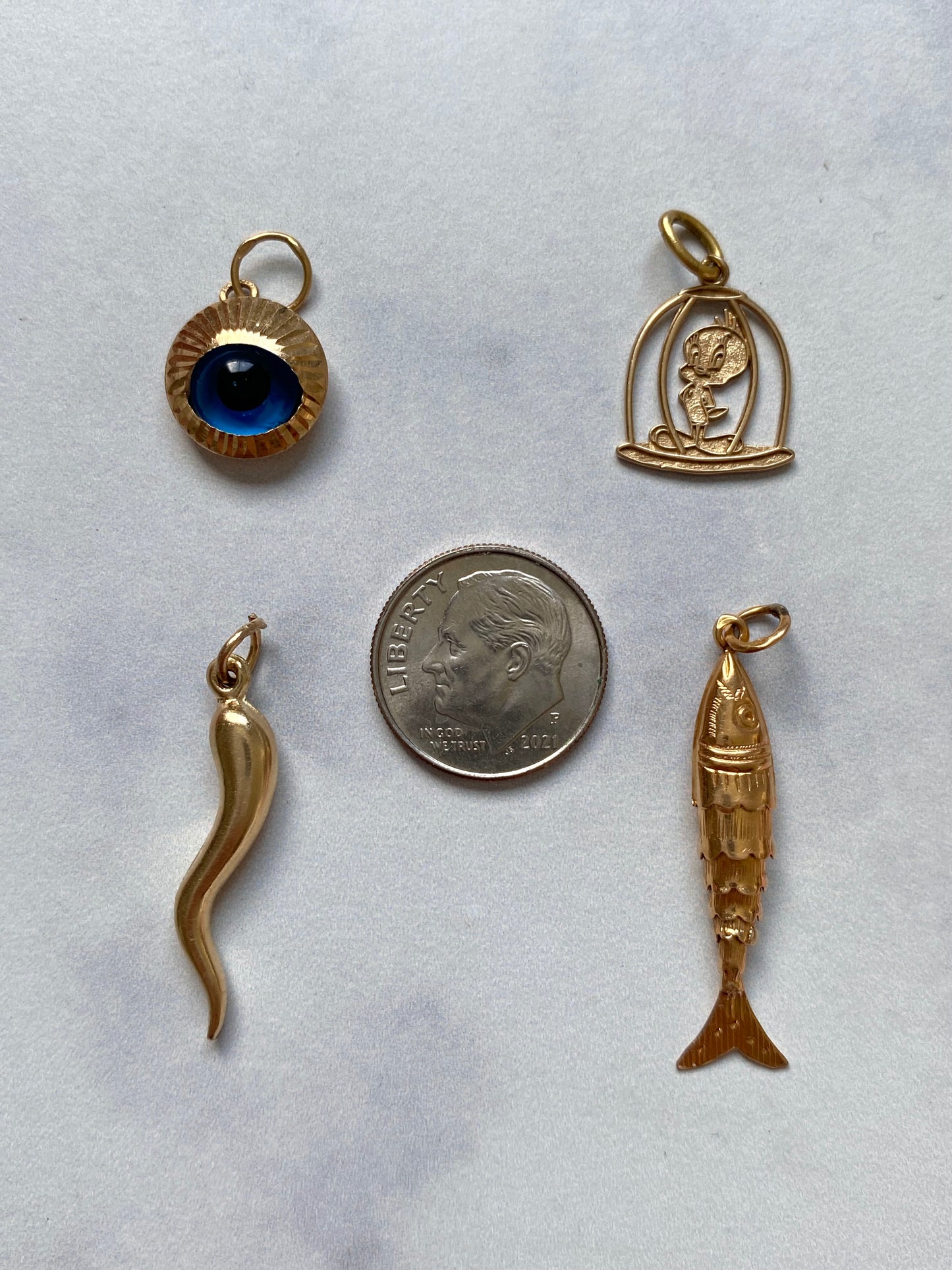 Small gold pendants and charms