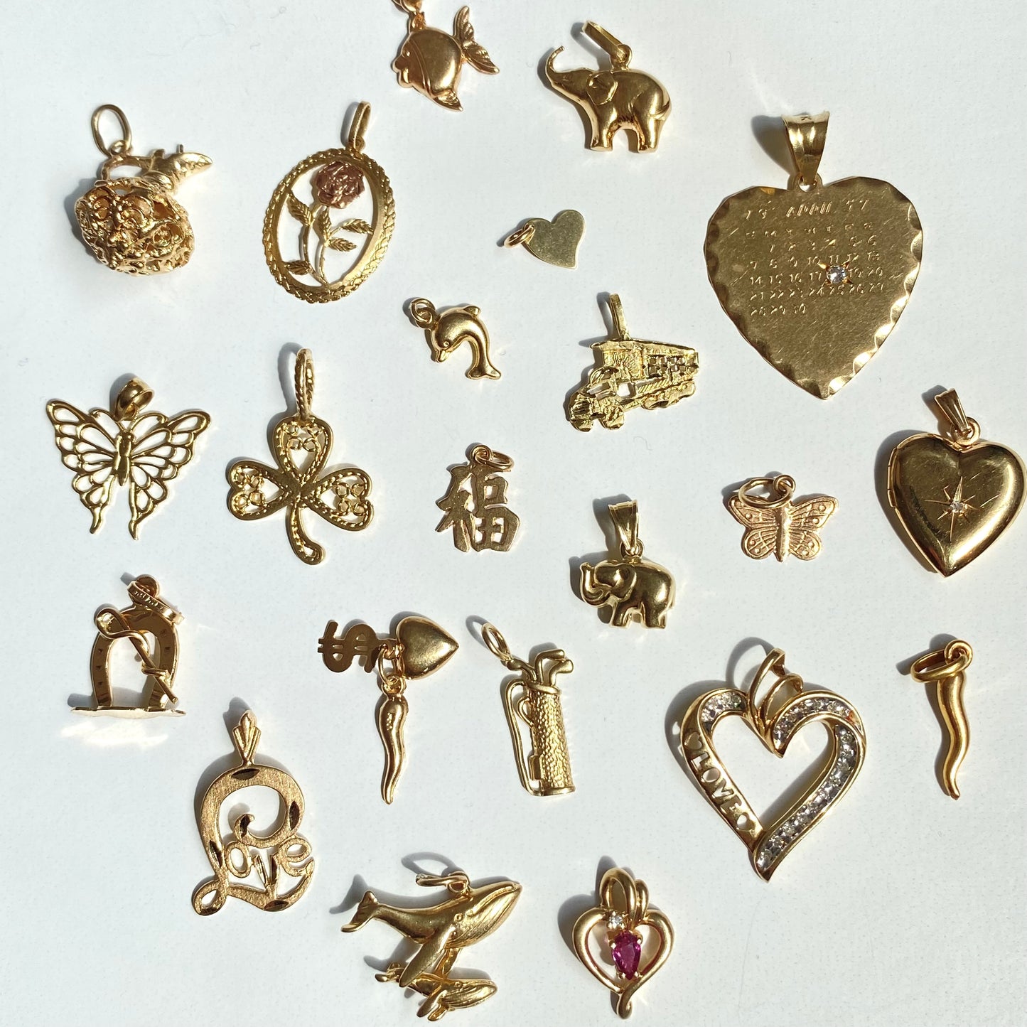 Small gold pendants/charms