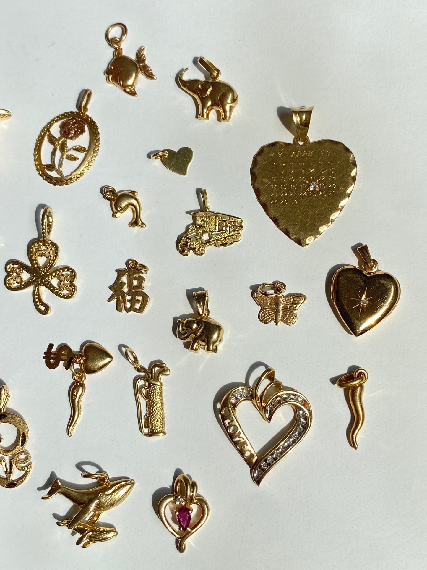 Small gold pendants/charms