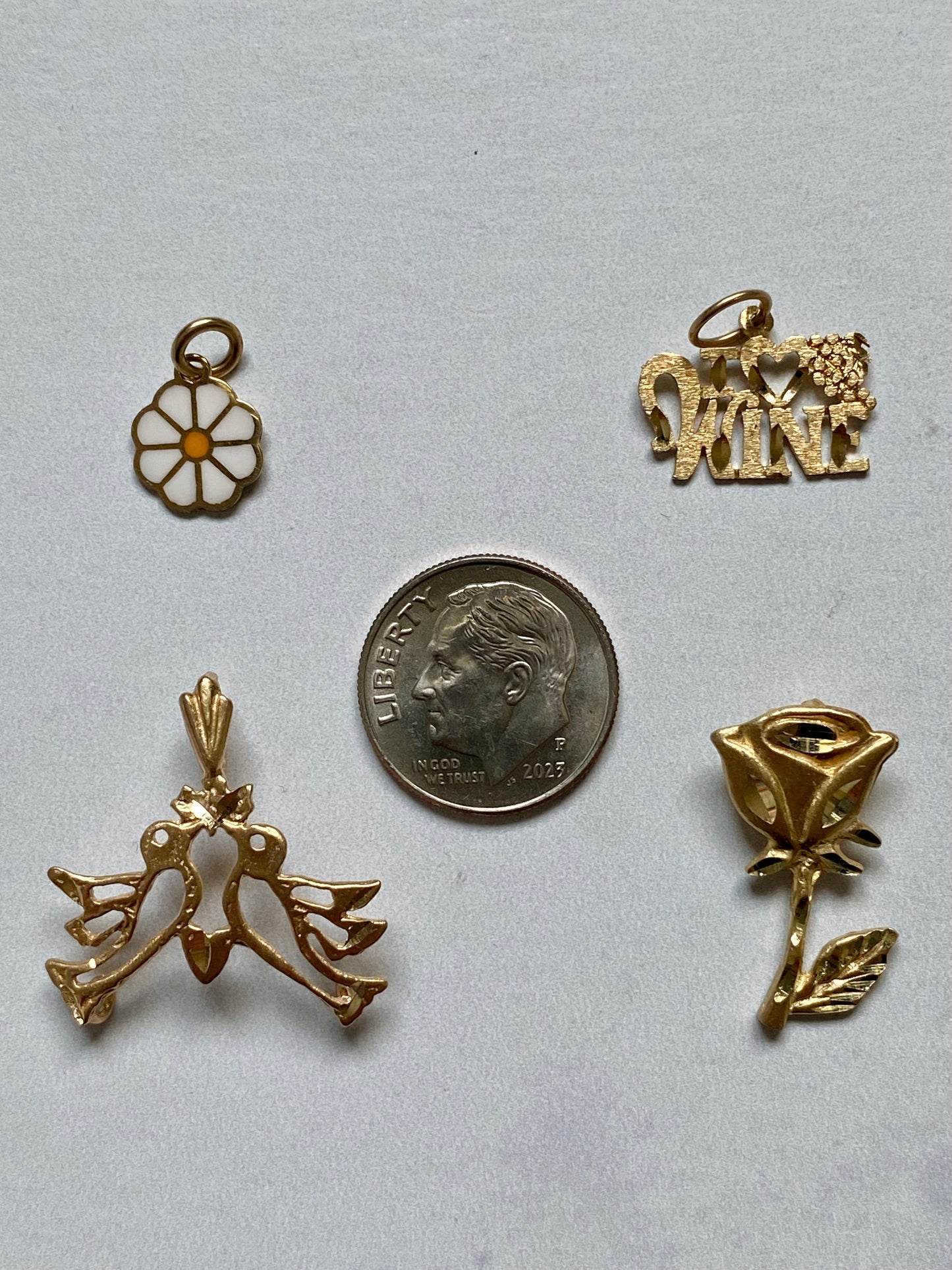 Small gold pendants and charms