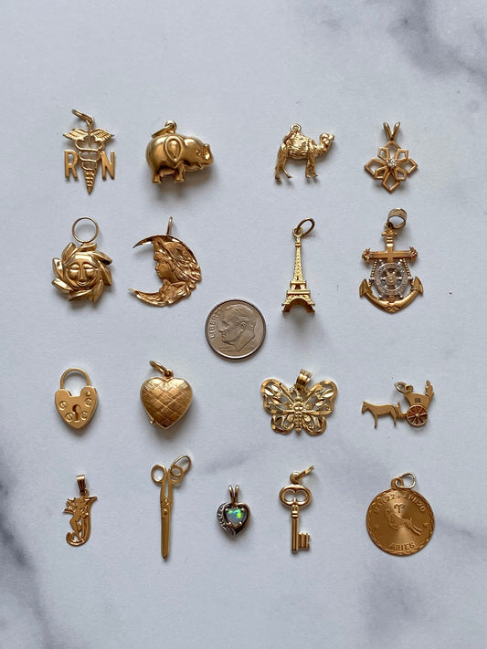 Small gold pendants and charms