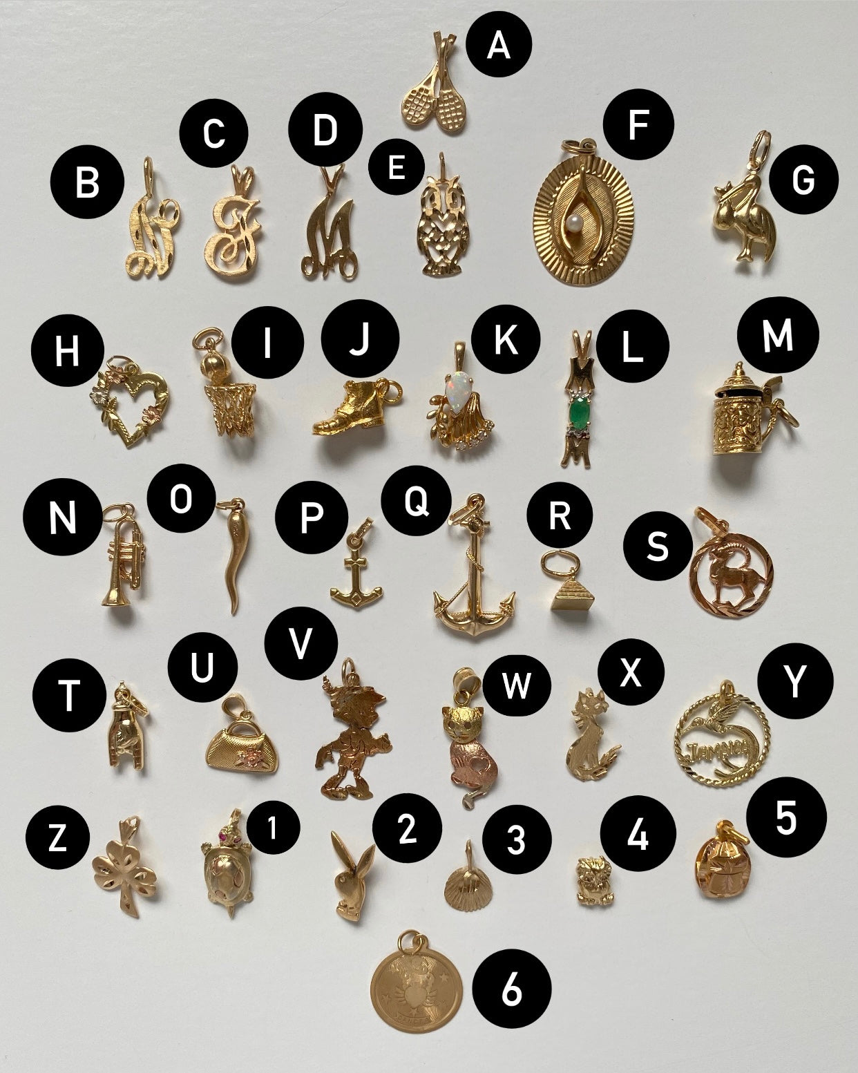 Small gold pendants and charms