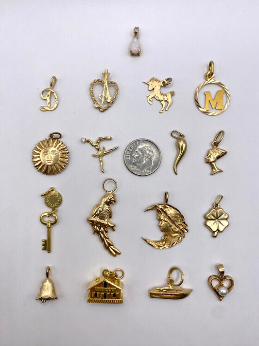 Small gold pendants and charms