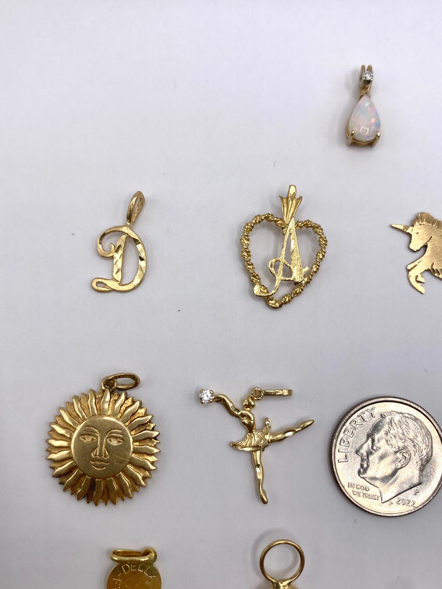 Small gold pendants and charms