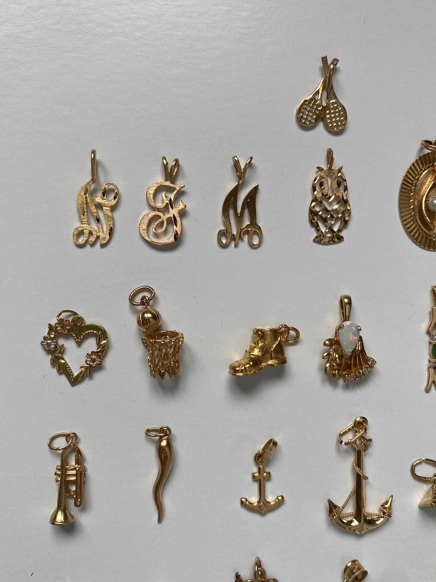 Small gold pendants and charms