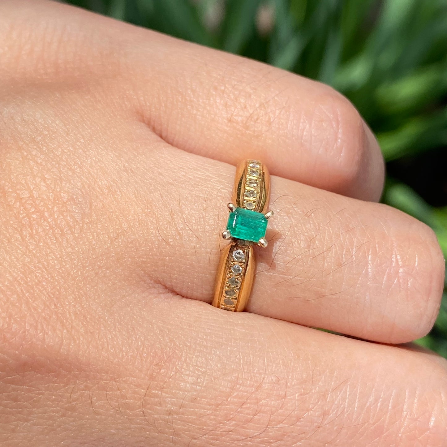 Emerald and diamond band ring