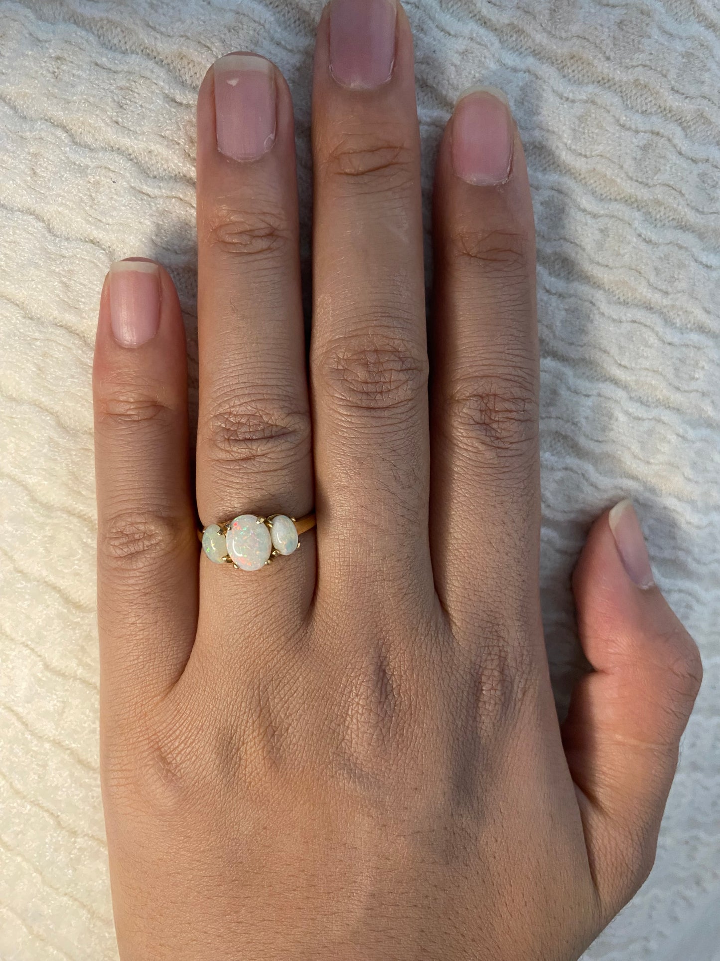 Three stone white opal ring