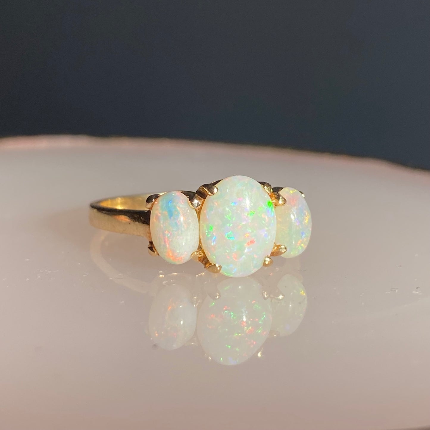 Three stone white opal ring