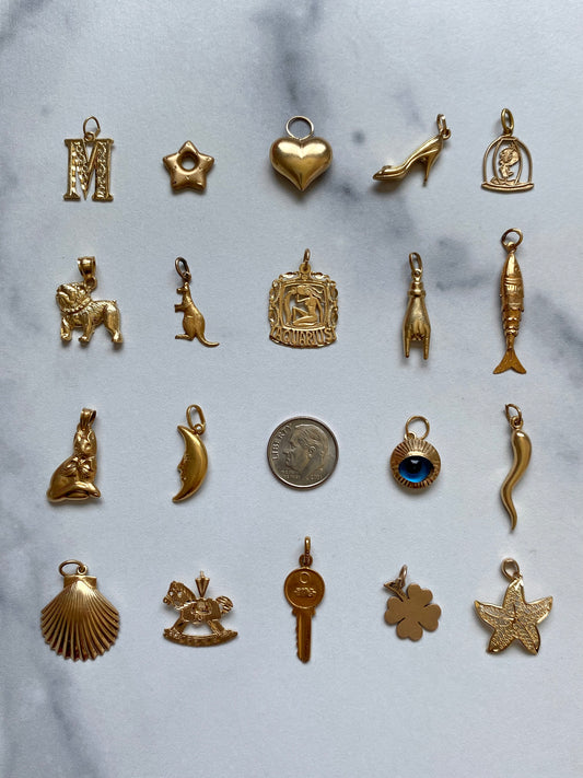 Small gold pendants and charms