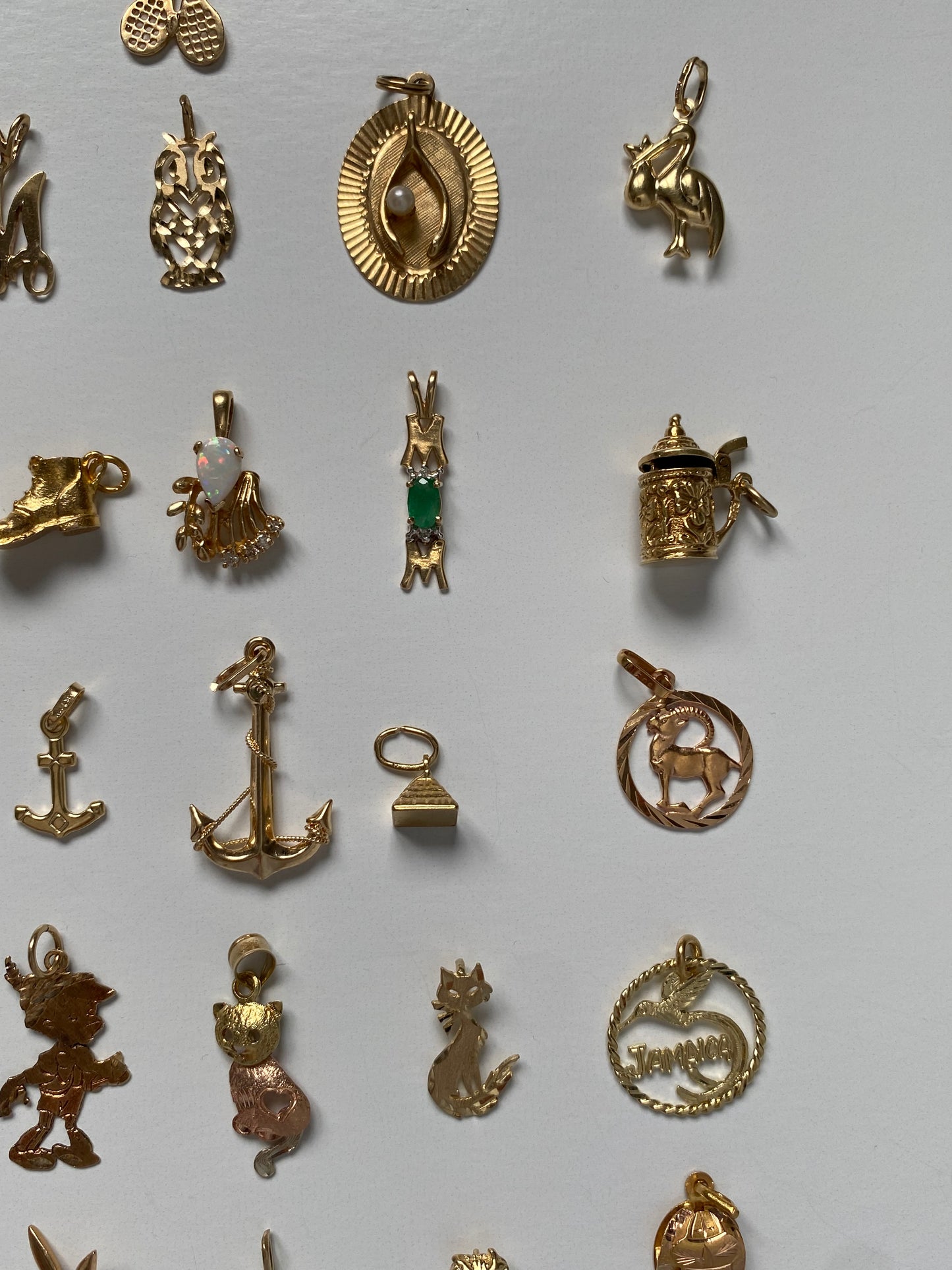 Small gold pendants and charms