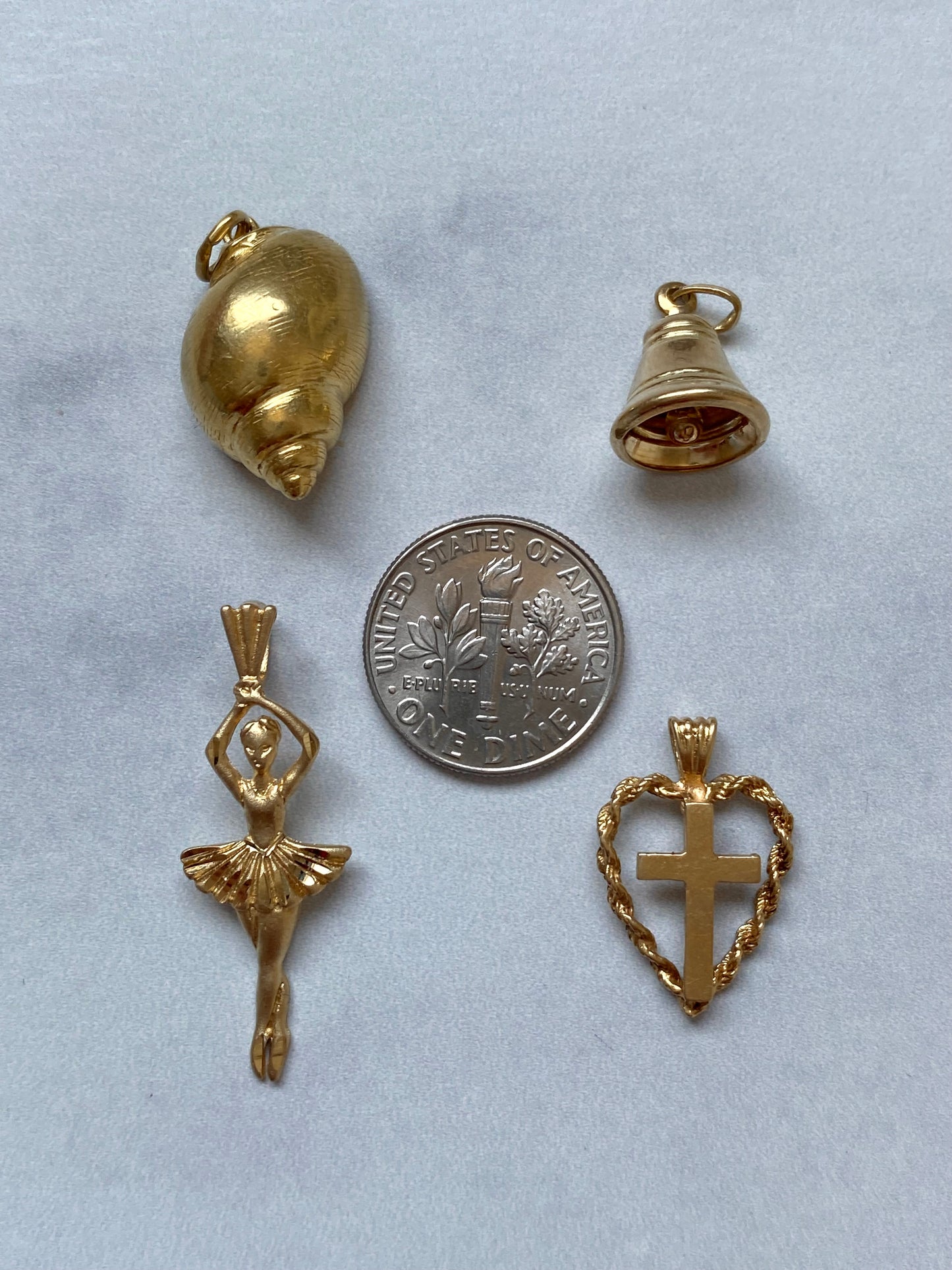 Small gold pendants and charms