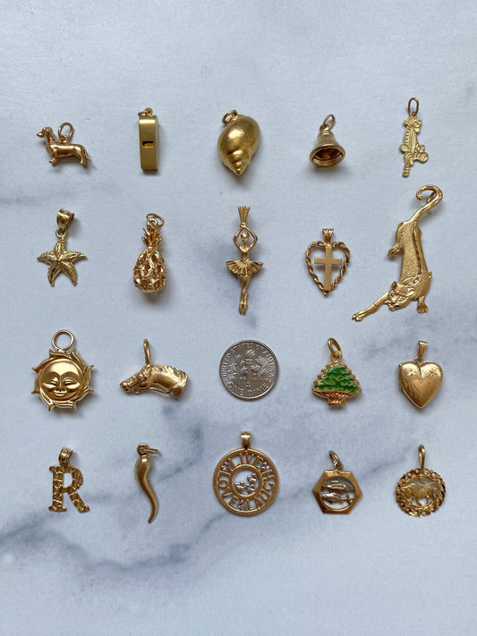 Small gold pendants and charms