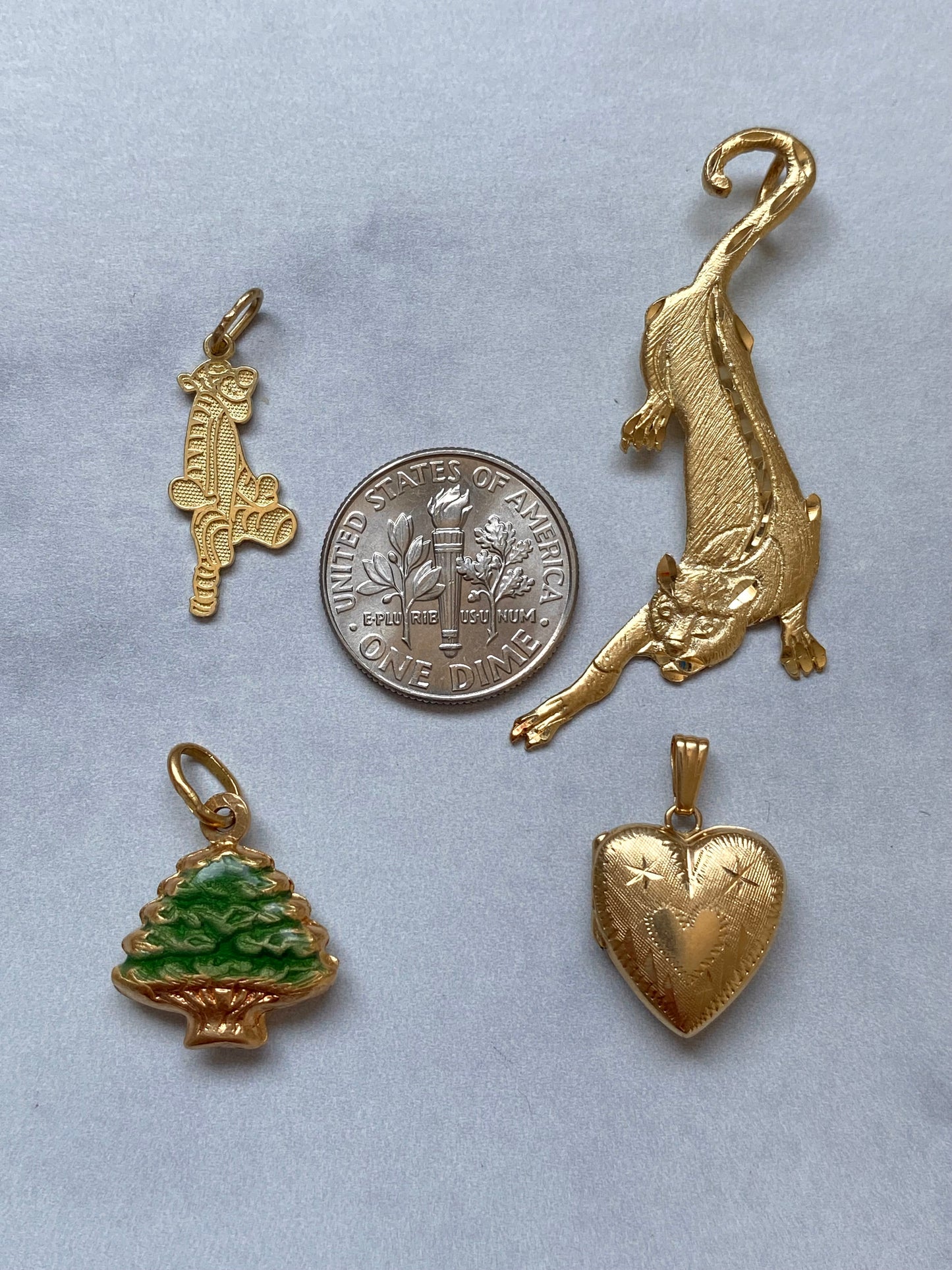 Small gold pendants and charms