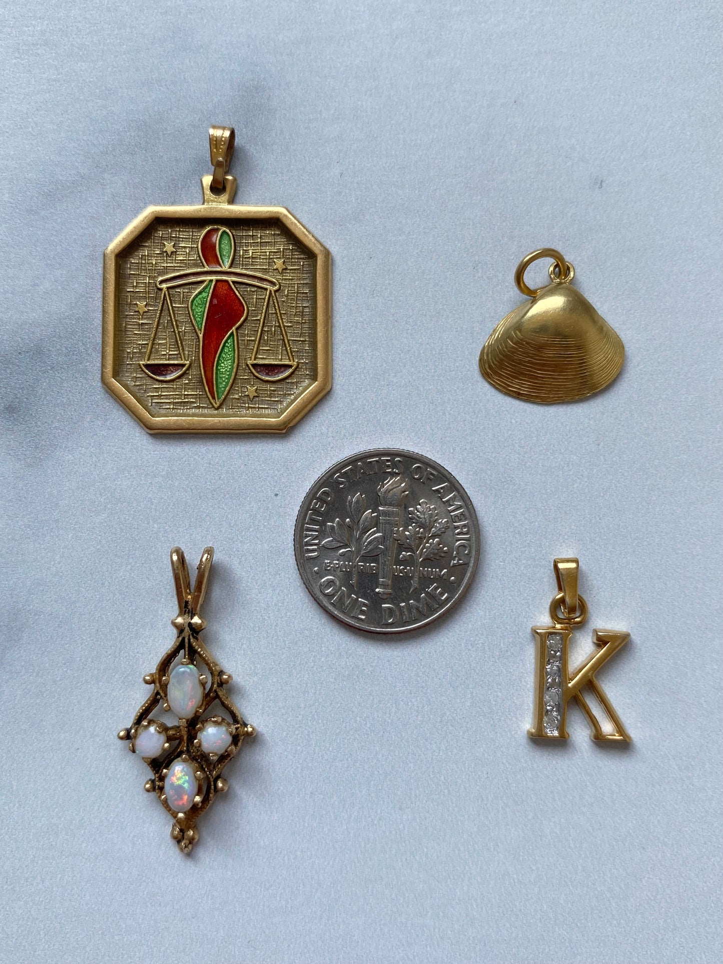 Small gold pendants and charms