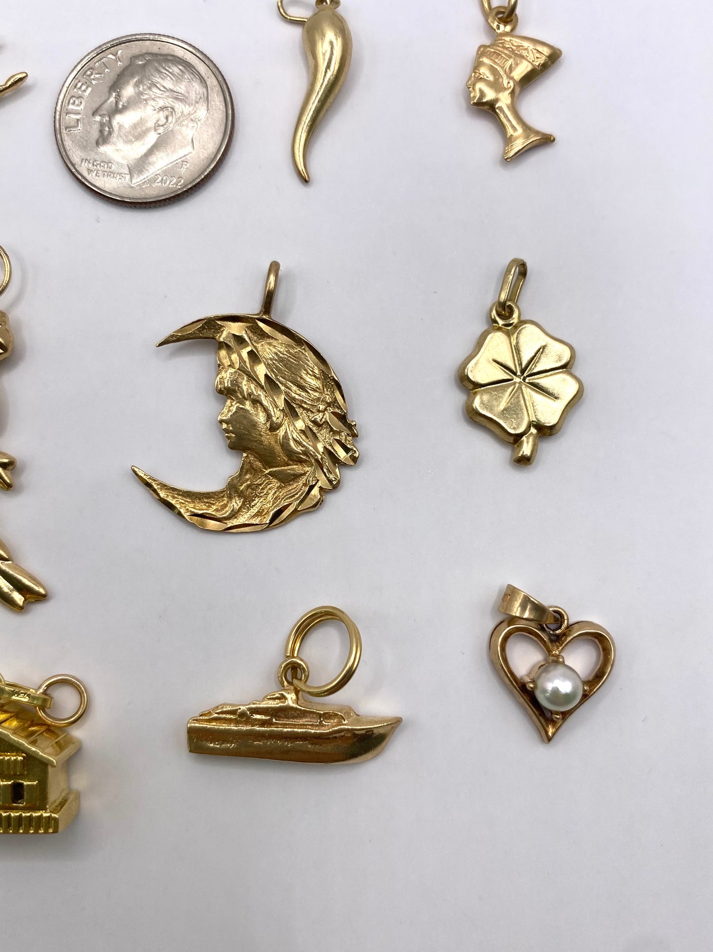 Small gold pendants and charms