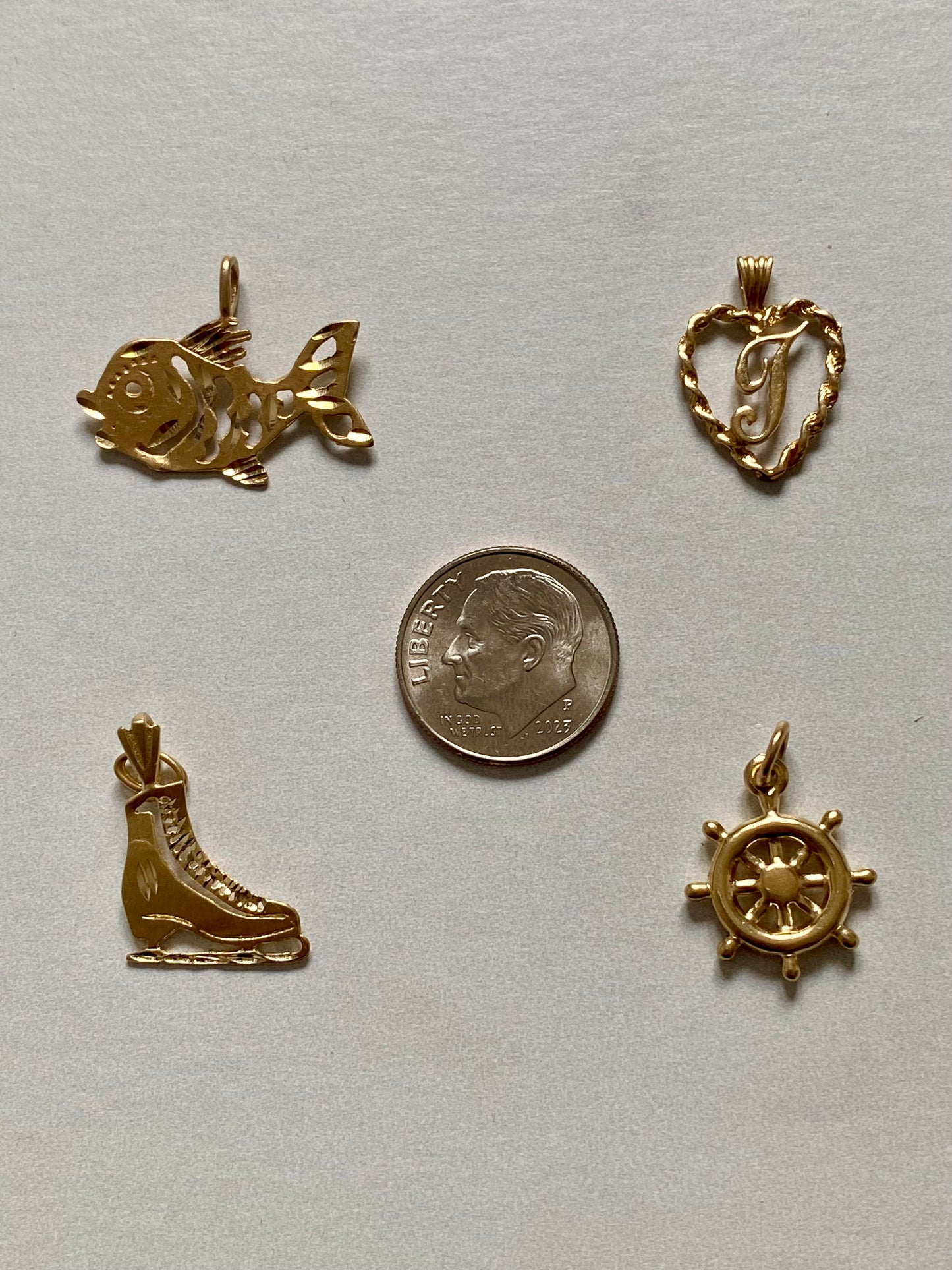 Small gold pendants and charms