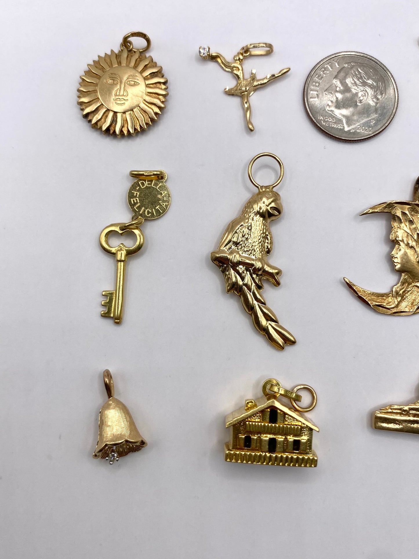 Small gold pendants and charms