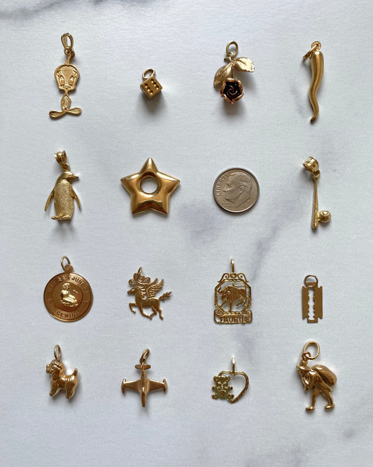 Small gold pendants and charms