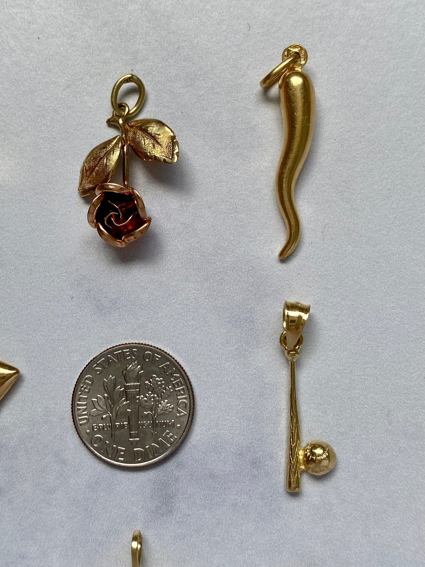 Small gold pendants and charms