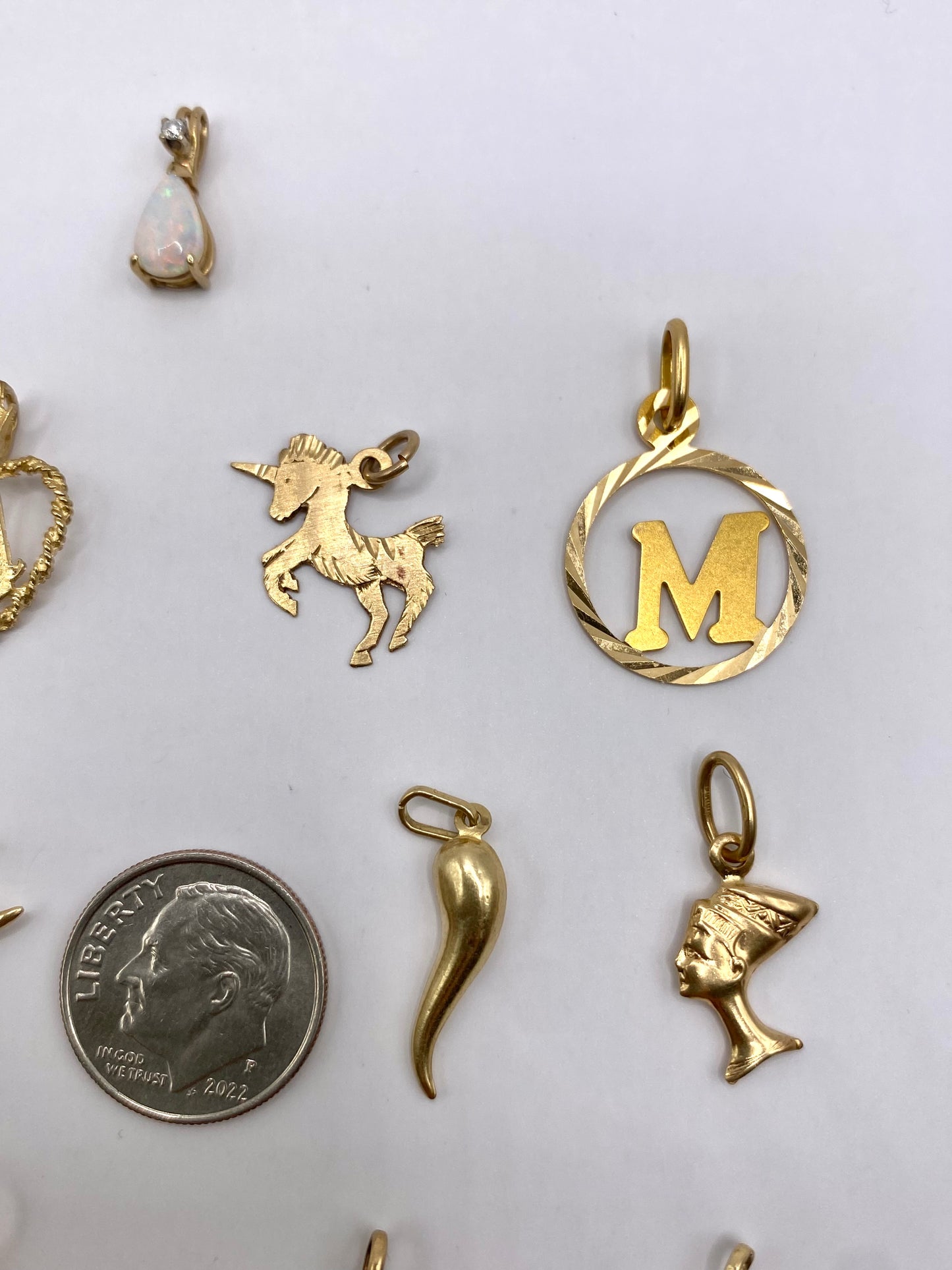 Small gold pendants and charms