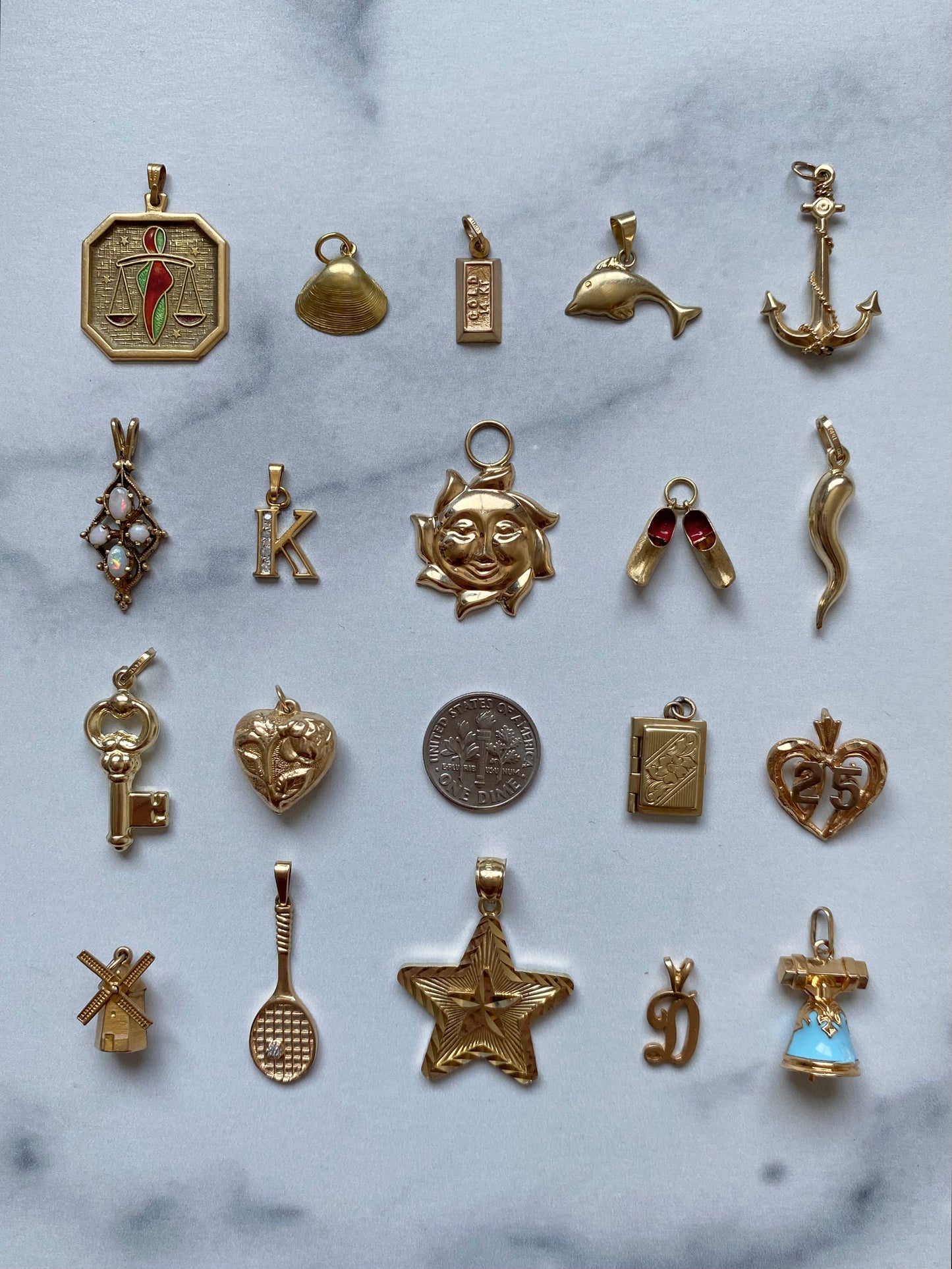 Small gold pendants and charms